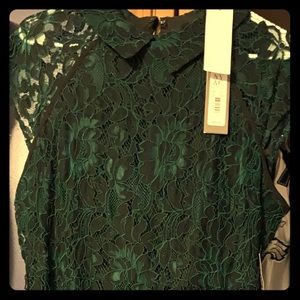 Green and black lace dress
